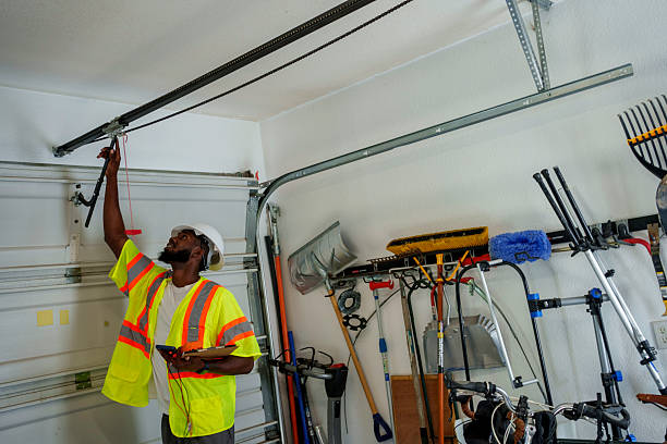Professional Garage Door Panel Replacement technician working in Wakarusa, IN